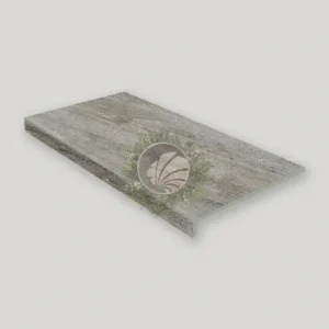 coronación de piscina porcelánica con efecto piedra oscura